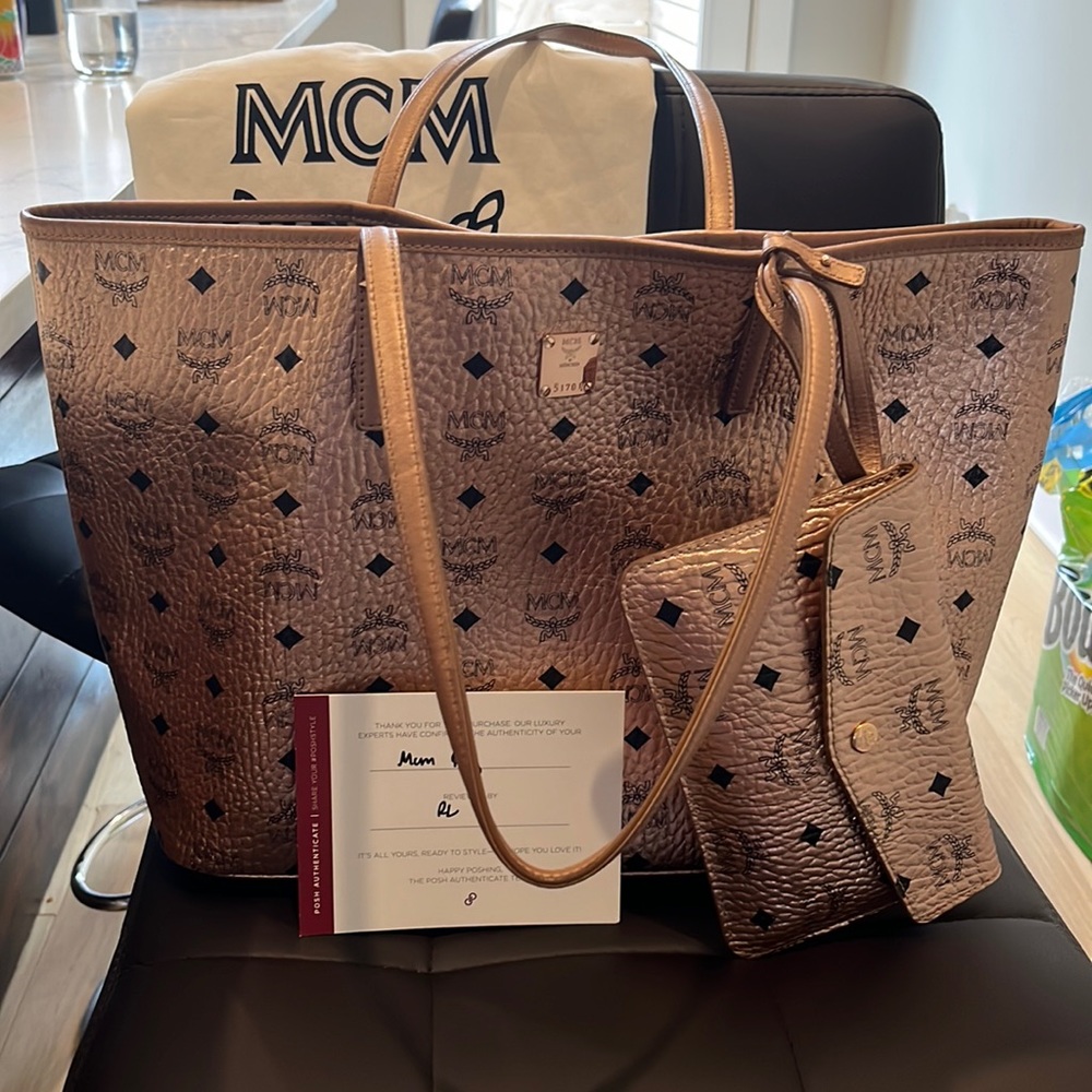 Authentic MCM tote with pouch in rose gold